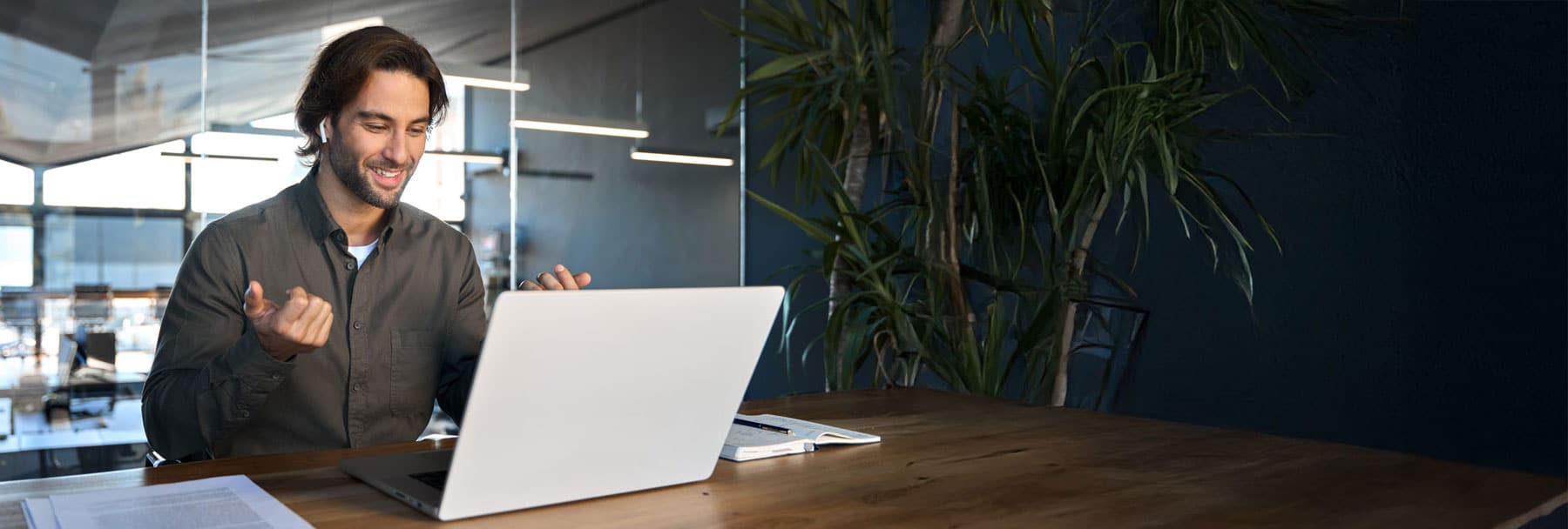 Man looking at laptop helping out web review
