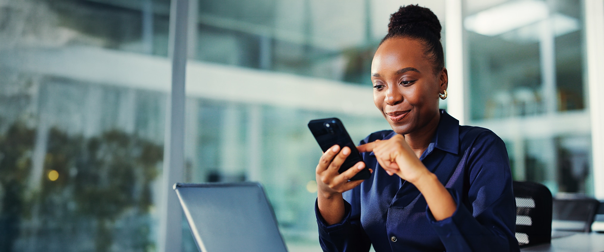 Strong business woman viewing affordable website phone